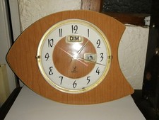 Ancienne horloge formica vintage "Fichic" avec dateur