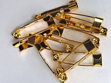 015238 lot 10 attaches pour insigne doré  25 mm