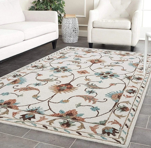 Tapis touffeté main - main, en