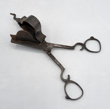 Paire de ciseaux éteignoir à