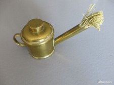 Petit arrosoir en cuivre avec mèche