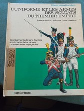 L'uniforme et les armes des