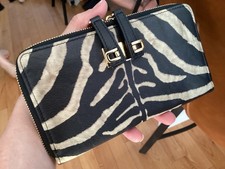 Furla porte feuille zebré beige et noir et or.