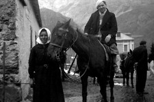Men on horseback women holding the bridle - antique photo negative. 1940 50
