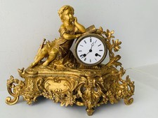 Pendule bronze doré