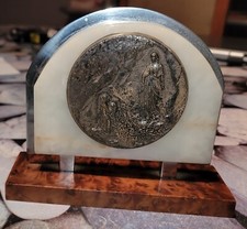 REGULATED OR TIN PLAQUE?..APPEARANCE OF THE VIRGIN WITH B.SOUBIROUS ON FOOT