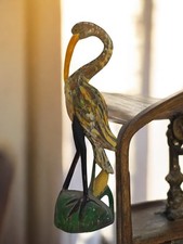 Ancien héron sculpté en bois