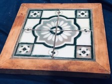 MID CENTURY TILE TRIVET WITH FOUR SECTIONAL TIL CENTER WOOD FRAME