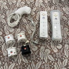 Wii Accessories 2 Wiimotes, Nunchuk 4 Wiimote Plus Adaptors