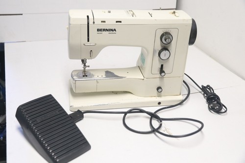 Reviser machine à coudre - a,