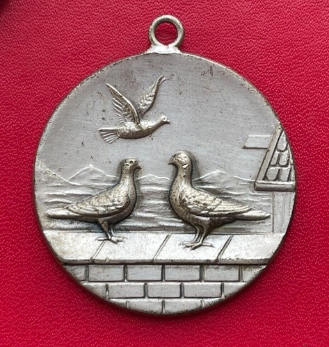 Belle médaille colombophilie