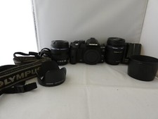 Olympus EVOLT E-520 10.0MP Kit w/ 14-42mm & 40-150mm zoom lens. All works great.