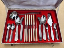 Ménagère vintage 49 pièces poinçon étoile manche bakélite avec coffret, inox