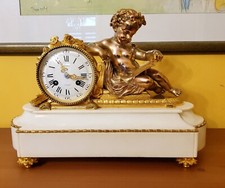 Pendule "Putto à l'étude" en