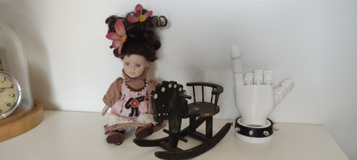 Poupée cheval bascule - et,