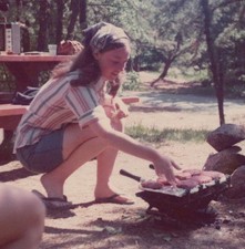1970s Woman Cooking Hamburgers Campfire Outdoor Picnic Table Camping Camp