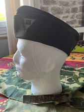 Calot , US, en Tricotin, de