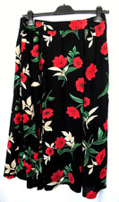 Jupe longue noire fleurie avec poches évasée T 46 élastiquée,  marque 3 SUISSES