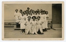 PHOTO CARD, young women in white blouse craft apprenticeship institute