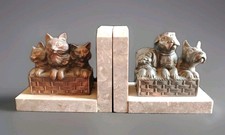 Pretty pair of greenhouse books in regular baskets dogs and cats