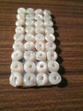 Plaque de 36 boutons anciens