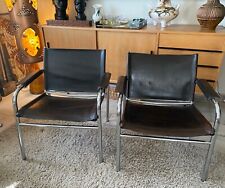 PAIR OF KLINTE, TWIST BJORKLUND BROWN LEATHER ARMCHAIRS 1980