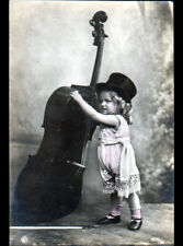 CELLIST / CHILD musician with CELLO or DOUBLE BASS in 1908