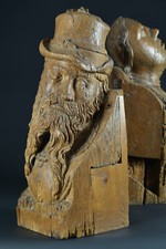 Pair of large wooden carved siding Flanders 15th portrait crow character