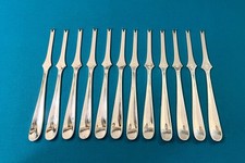 12 curettes à homard