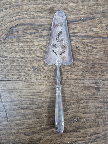 Ancienne pelle tarte en - pelle, a
