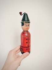 1 music box (rattlesnake?) carved wood forming a character (circus?) 