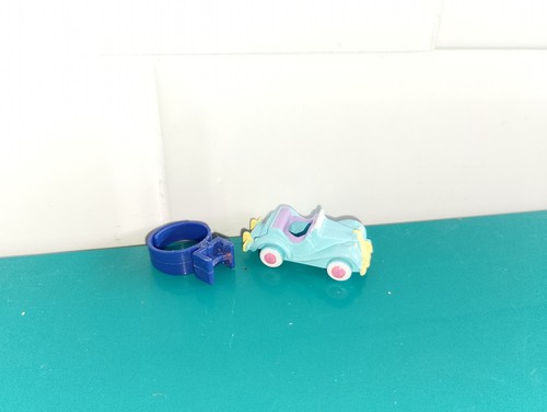 Polly pocket figurine doll
