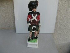 Ancienne bouteille  à musique de Whisky   en forme de Soldat Ecossais en kilt.