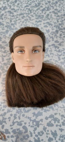 Tête poupée tonner - de,