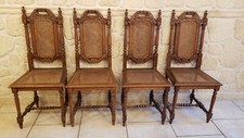 Lot de 4 chaises vintage cannées sculptées