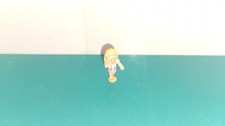 Polly pocket figurine doll