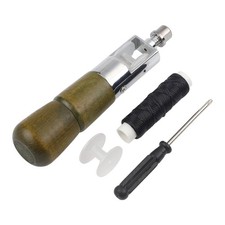 Machine à coudre à la main