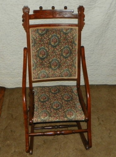 Walnut carved fold rocker - carved, up
