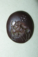 Intaille antique sassanide grecque Perse hématite lion attaquant une gazelle