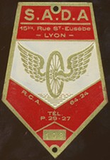 CYCLES BICYCLE S.A.D.A, winged wheel, 15 Rue St EUSEBE Lyon, painted metal