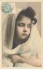 Child - girl with a veil covering her head