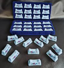 Lot de 36 porte-couteaux en