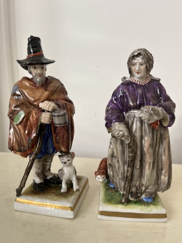 Paire figurines en - de,