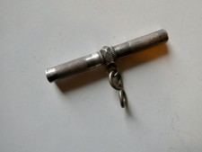 CLEF DE MONTRE EN ARGENT