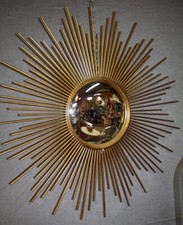 Miroir soleil en métal doré