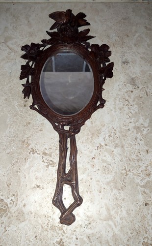 Miroir face main foret - à,