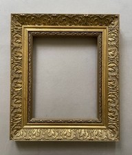 Cadre en bois et stuc doré