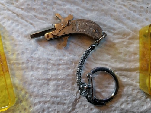 Porte cle pistolet - porte, rare