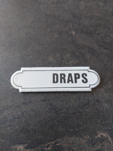 Plaque émaillée draps meuble