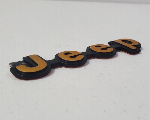 Logo jeep couleur dorée - :,